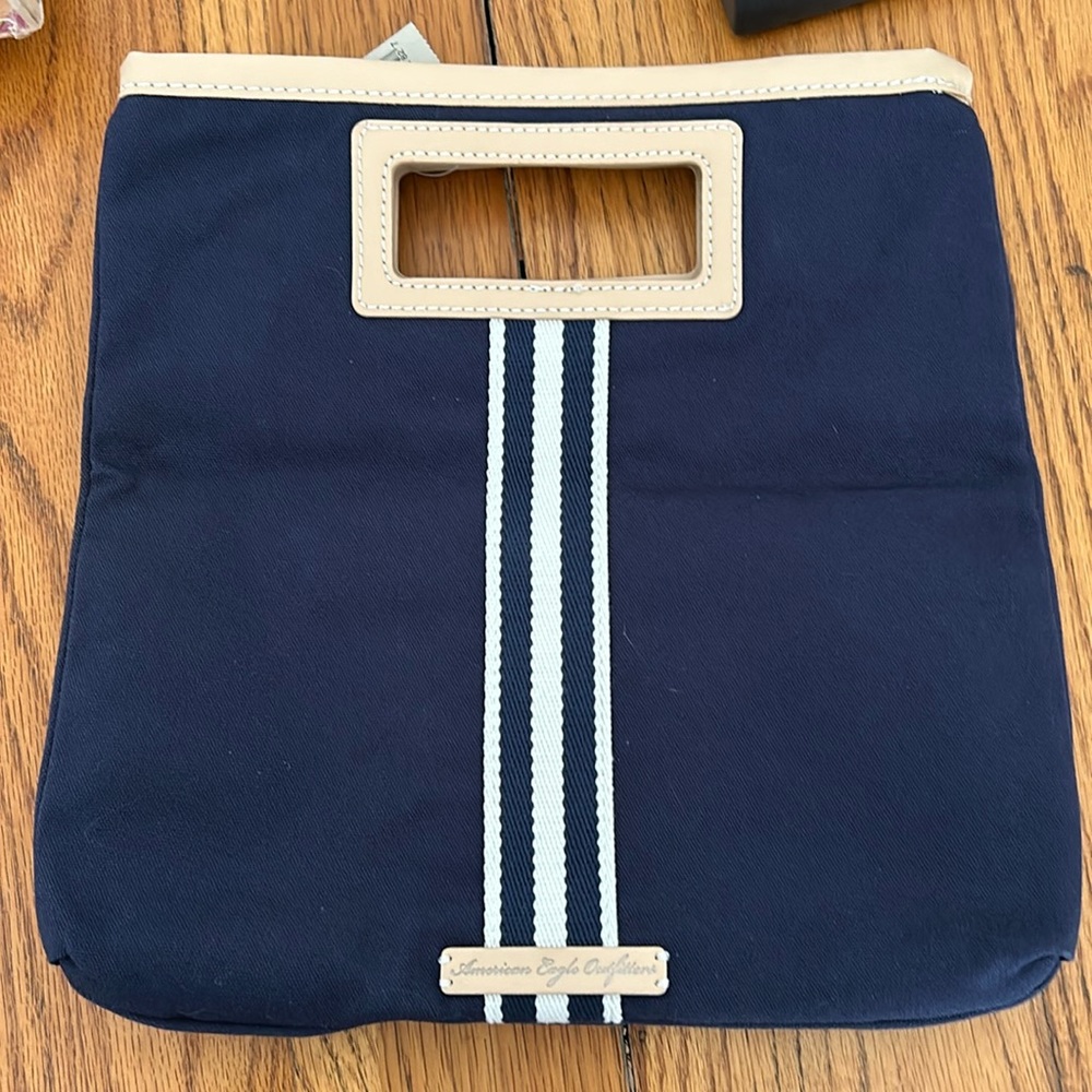 American Eagle outfitter handbag. New with tag. Blue with white stripes.